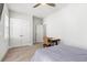 Bright bedroom featuring carpet flooring, a ceiling fan, and a large double-door closet at 2942 Clearwater Dr, Mount Pleasant, SC 29466