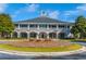 An exterior front view of the clubhouse at Dunes West, showcasing its architecture and welcoming entrance at 2942 Clearwater Dr, Mount Pleasant, SC 29466