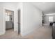 View of hallway leading to a bathroom and bedroom with carpet flooring at 2942 Clearwater Dr, Mount Pleasant, SC 29466