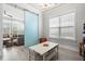 Cozy living room with sliding barn door and ample natural light at 2942 Clearwater Dr, Mount Pleasant, SC 29466