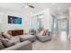 Bright living room with barn doors and media arrangement at 2942 Clearwater Dr, Mount Pleasant, SC 29466
