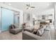 Bright and airy living room flowing into kitchen with sliding barn doors at 2942 Clearwater Dr, Mount Pleasant, SC 29466