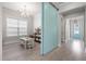 Bright, airy living room featuring a large window and barn door detail at 2942 Clearwater Dr, Mount Pleasant, SC 29466