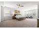 Spacious primary bedroom with sitting area and many windows for natural light at 2942 Clearwater Dr, Mount Pleasant, SC 29466