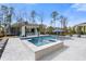 Beautiful backyard pool and spa area with lounge space and privacy fencing at 2942 Clearwater Dr, Mount Pleasant, SC 29466