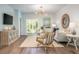 Comfortable living room showcasing stylish furnishings, wood floors, and an open layout at 305 Pine Crest View Dr, Summerville, SC 29486