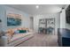 Cozy living room with a comfortable sofa and dedicated desk space for work or study at 305 Pine Crest View Dr, Summerville, SC 29486