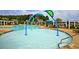 Zero entry community pool with water features and plenty of seating at 305 Pine Crest View Dr, Summerville, SC 29486