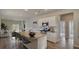 Bright kitchen with granite countertops, stainless steel appliances, and a large kitchen island at 305 Tiliwa Street, Summerville, SC 29486