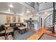 Stylish living space with a spiral staircase, white kitchen with granite countertops, and modern decor at 377 King St # 203, Charleston, SC 29401