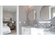 Bright bathroom features double vanity, granite countertops, and modern fixtures at 4 Preserve Rd, Johns Island, SC 29455