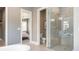 A beautifully designed bathroom features a glass enclosed shower, toilet, and shiplap walls at 4 Preserve Rd, Johns Island, SC 29455