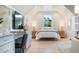Bright bedroom with desk, vaulted ceilings, and a large window at 4 Preserve Rd, Johns Island, SC 29455