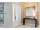 Inviting entryway with natural wood accents, a modern chandelier, and art on the wall at 4 Preserve Rd, Johns Island, SC 29455