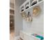 A delightful entryway has built in storage, shelving, and a hat rack at 4 Preserve Rd, Johns Island, SC 29455