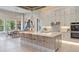 Bright, airy kitchen featuring white cabinets, stainless steel appliances, and an adjacent dining area at 4 Preserve Rd, Johns Island, SC 29455