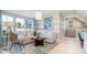 Cozy living room with comfortable seating, bright windows, and ample natural light at 4 Preserve Rd, Johns Island, SC 29455