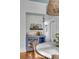 Stylish home bar featuring a sink, mirrored backsplash, open shelving, and space to display your favorite libations at 40 State St # 1, Charleston, SC 29401