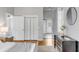 Bedroom featuring 3 closets/doorways and hardwood floors at 40 State St # 1, Charleston, SC 29401