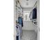 Walk-in closet featuring built-in storage and patterned floors at 40 State St # 1, Charleston, SC 29401