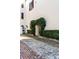 Charming house entrance adorned with lush ivy and a stone walkway at 40 State St # 1, Charleston, SC 29401