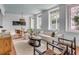 Inviting living room with ample natural light, a stylish seating area, and hardwood flooring, perfect for relaxation at 40 State St # 1, Charleston, SC 29401