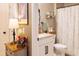 Bathroom featuring a granite vanity, updated fixtures, and a shower-tub combination at 409 Spruce Ivy St, Moncks Corner, SC 29461