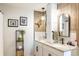 Beautiful bathroom showcasing dual sinks, stylish lighting, and decorative accents at 409 Spruce Ivy St, Moncks Corner, SC 29461
