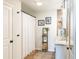 Bright bathroom featuring dual sinks, modern fixtures, and elegant decor at 409 Spruce Ivy St, Moncks Corner, SC 29461