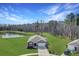 Well-maintained single-Gathering home featuring a two-car garage and landscaped yard at 409 Spruce Ivy St, Moncks Corner, SC 29461
