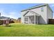 Fenced backyard with a covered patio and a swing at 416 Forest Hills Rd, Summerville, SC 29486