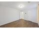 Bedroom with wood-look floors and a view to an adjoining bathroom at 416 Forest Hills Rd, Summerville, SC 29486