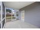 Covered screened patio providing an outdoor seating area at 416 Forest Hills Rd, Summerville, SC 29486