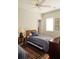 Cozy bedroom featuring a bed with a wicker headboard and a ceiling fan at 42 1/2 Hasell St, Charleston, SC 29401