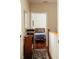 Hallway view into bedroom with a bed and natural light at 42 1/2 Hasell St, Charleston, SC 29401