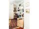Cozy library space with floor-to-ceiling bookshelves and comfortable armchairs at 42 1/2 Hasell St, Charleston, SC 29401