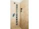 Shower stall with glass block accent and tiled walls, complete with built-in shelving at 42 1/2 Hasell St, Charleston, SC 29401