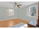 Cozy bedroom with hardwood floors and neutral walls, creating a tranquil space for relaxation at 425 Ravenwood Rd, Walterboro, SC 29488