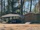 Carport and shed on the property, offering practical solutions for vehicle and outdoor equipment storage at 425 Ravenwood Rd, Walterboro, SC 29488
