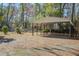 Exterior view of a carport and driveway, providing covered parking and convenient access at 425 Ravenwood Rd, Walterboro, SC 29488