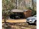 Carport and shed, providing covered parking and additional storage options on the property at 425 Ravenwood Rd, Walterboro, SC 29488