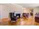 Inviting living room with a fireplace, cozy seating, and warm lighting at 425 Ravenwood Rd, Walterboro, SC 29488