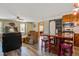Inviting living area seamlessly blends with a modern kitchen featuring stainless steel appliances and stylish island seating at 425 Ravenwood Rd, Walterboro, SC 29488