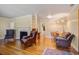 Cozy living room with a fireplace, comfortable seating, and an open layout at 425 Ravenwood Rd, Walterboro, SC 29488