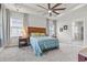 Bedroom with a ceiling fan and large windows providing ample natural light at 530 Amalie Farms Dr, Charleston, SC 29492