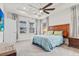 Bright primary bedroom with trey ceiling, fan and large windows at 530 Amalie Farms Dr, Charleston, SC 29492