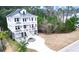 New construction home with an attached garage, an extended driveway, and a large yard at 530 Amalie Farms Dr, Charleston, SC 29492