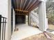 View of the back of home with access to exterior basement door and white stairs at 530 Amalie Farms Dr, Charleston, SC 29492