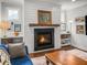 Stylish fireplace with shiplap and decor, complemented by a comfortable living space at 530 Amalie Farms Dr, Charleston, SC 29492