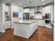 Spacious kitchen with large center island, stainless steel appliances, and white cabinets at 530 Amalie Farms Dr, Charleston, SC 29492